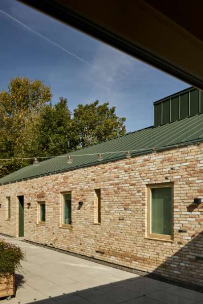 Green steel profiles set the framework for a rural family collective, Ølbyvej 178, 4623 Lille Skensved, Denmark